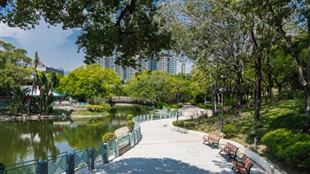 The Artificial Lake is bordered by a meandering path with seating provided under the shade trees, offering a comfortable place for enjoyment of the tranquillity.